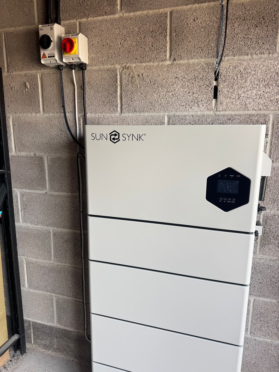 Sunsynk hybrid inverter and stacked battery system installed in a garage