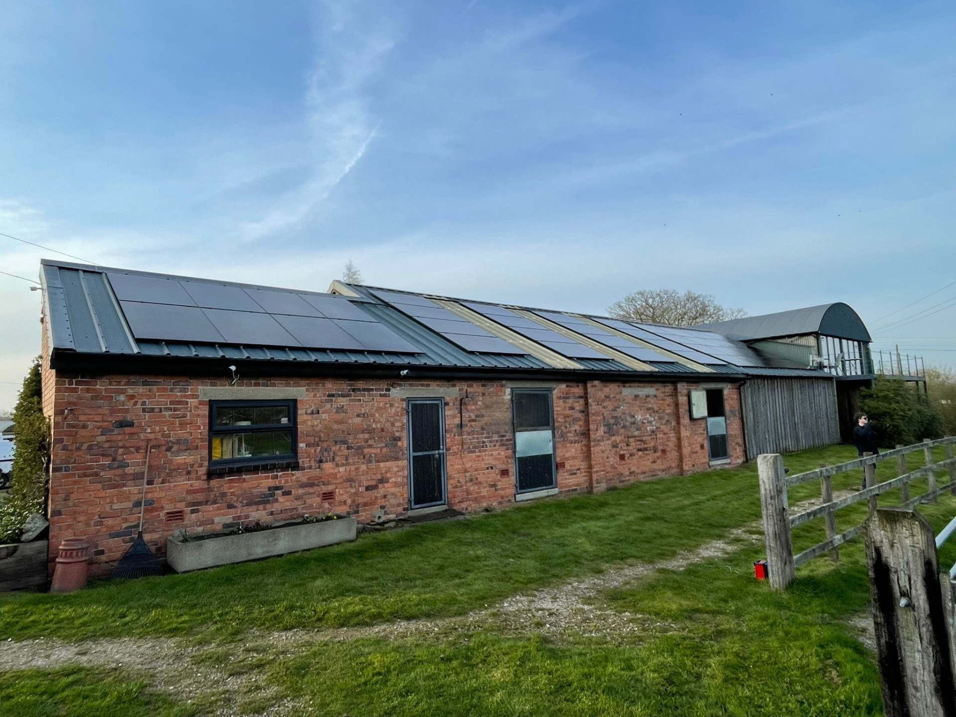 Callum’s brick building with rooftop solar panels in rural Herefordshire